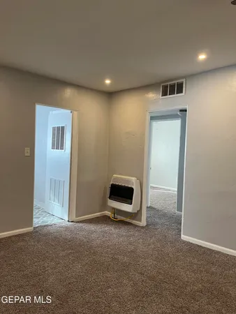 a view of a livingroom with a hallway