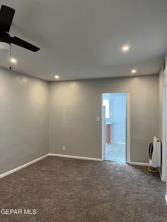 an empty room with a projector