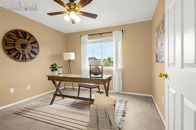 11045 Falling Star Road Fountain, CO 80817 - Photo 21 of 39 Carpeted office space featuring baseboards and ceiling fan