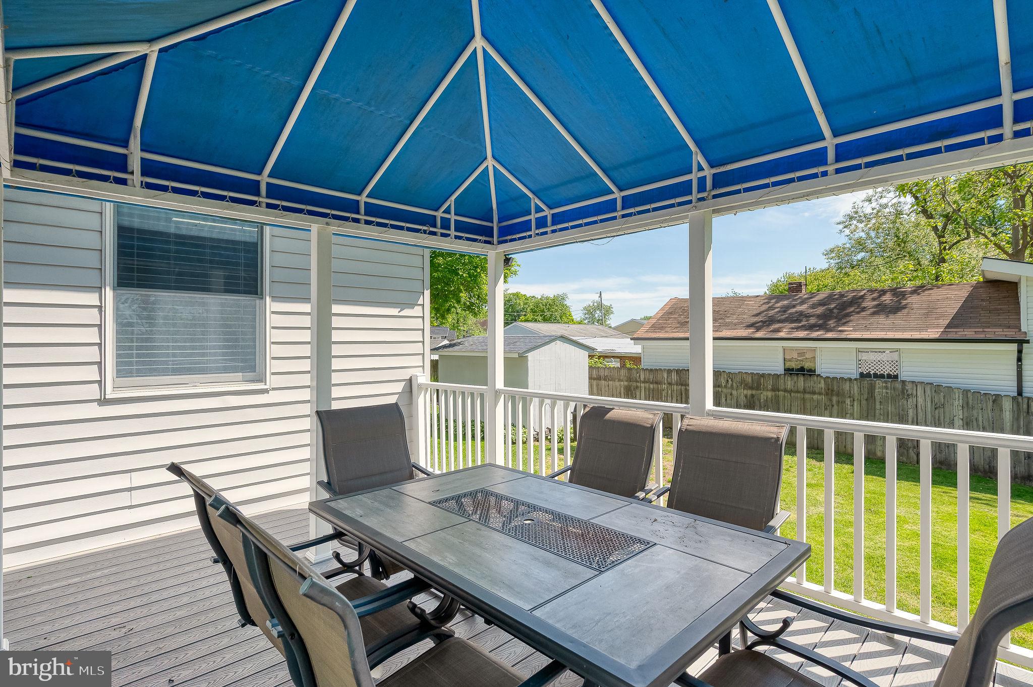 2222 Monocacy Road Essex, MD 21221 - Photo 33 of 70 Sunny patio with blue canopy shade.