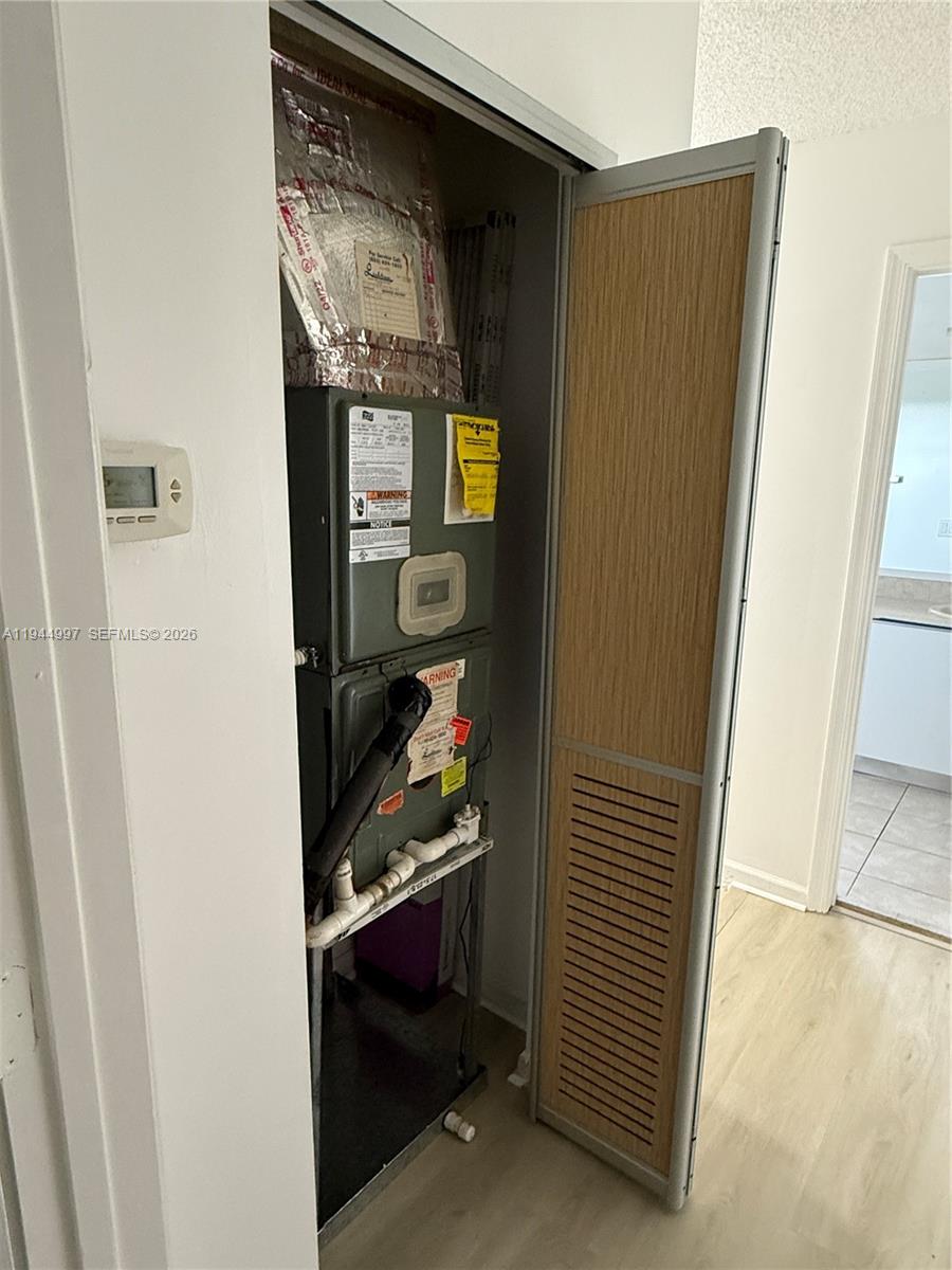 973 Imperial Lake Road, Unit 973 West Palm Beach, FL 33413 - Photo 17 of 28 a view of walk in closet