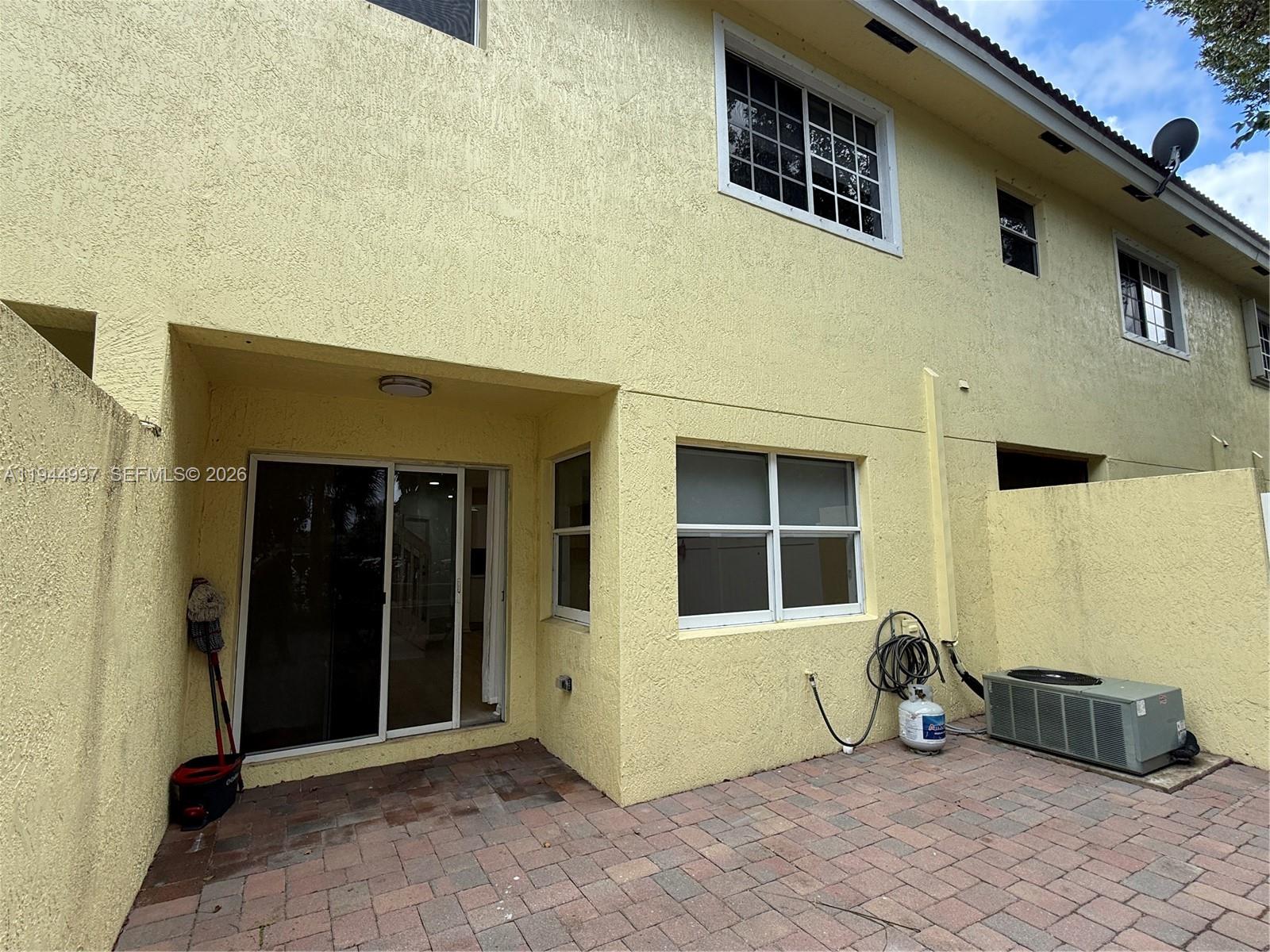 973 Imperial Lake Road, Unit 973 West Palm Beach, FL 33413 - Photo 27 of 28 a view of a entryway door front of a building