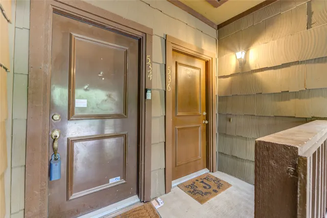 a view of entryway with a front door