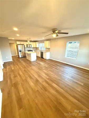 a view of a kitchen with a sink