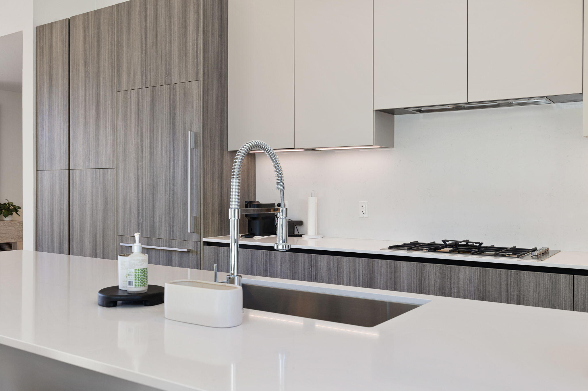 57809 Santo Thomas La Quinta, CA 92253 - Photo 17 of 51 a kitchen with a sink and white cabinets