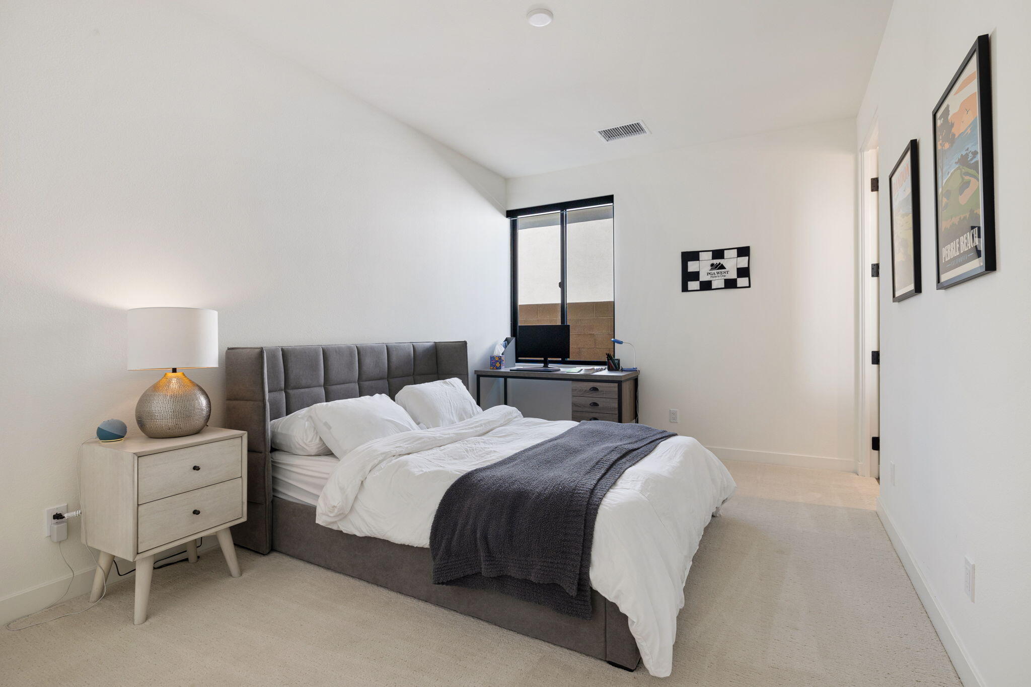 57809 Santo Thomas La Quinta, CA 92253 - Photo 30 of 51 a bedroom with a bed and window