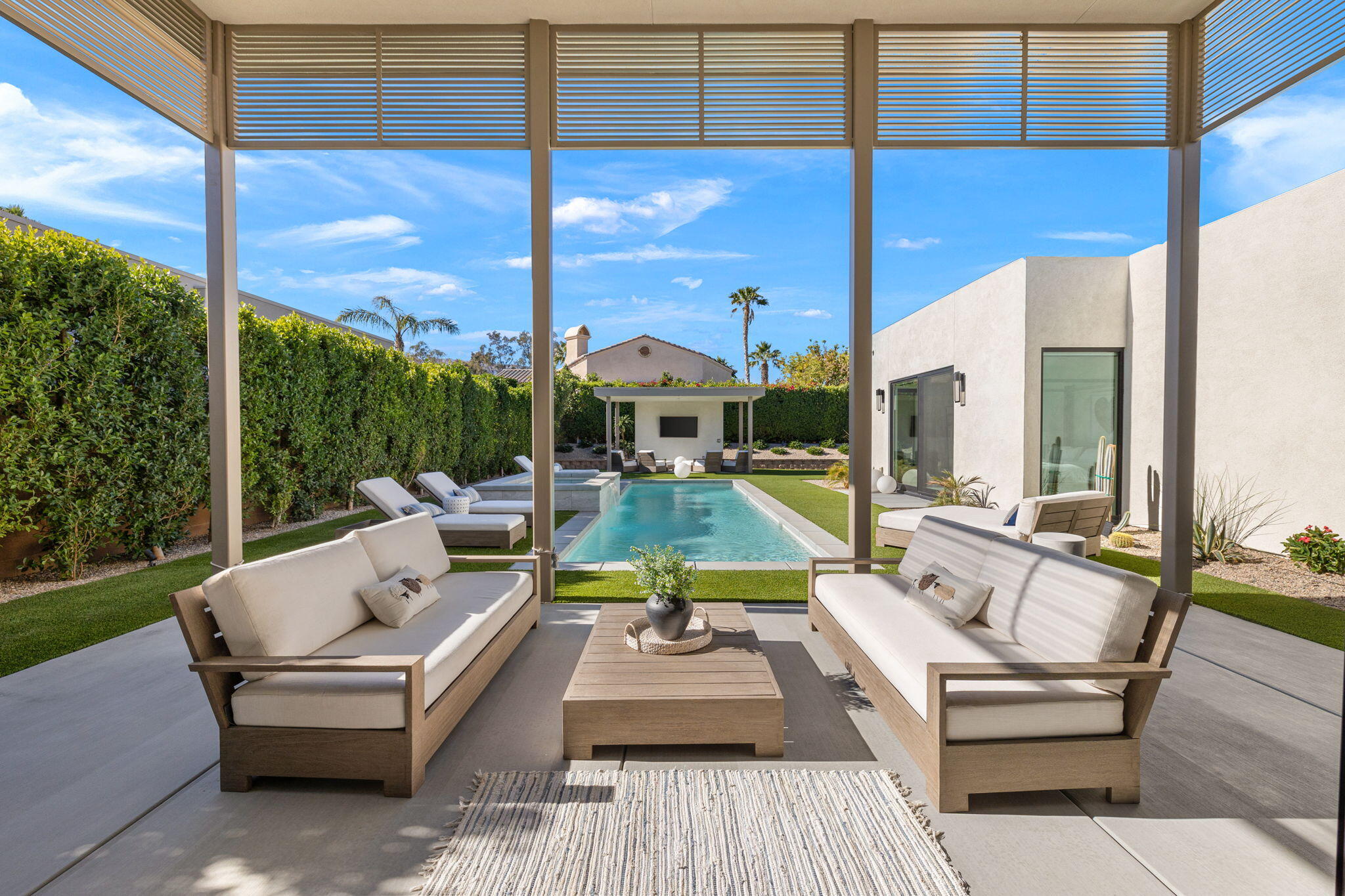 57809 Santo Thomas La Quinta, CA 92253 - Photo 35 of 51 a view of a patio with couches table and chairs