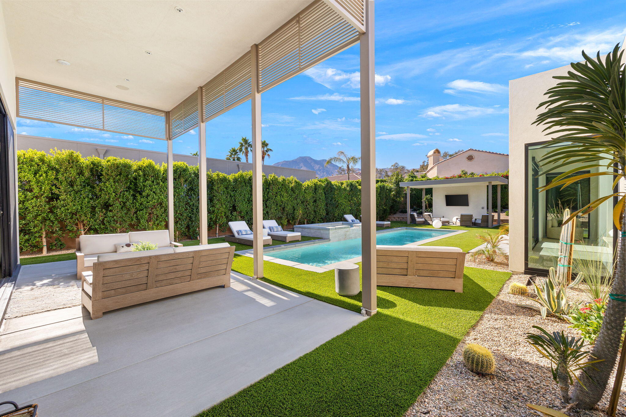 57809 Santo Thomas La Quinta, CA 92253 - Photo 37 of 51 a view of swimming pool with a couches and swimming pool