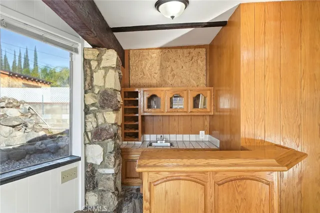 a bathroom with a tub and shower