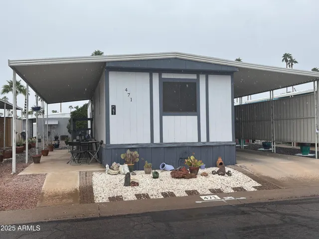 a view of a living room and a wooden floor