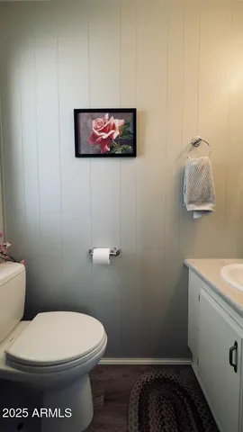 a bathroom with a toilet and a sink
