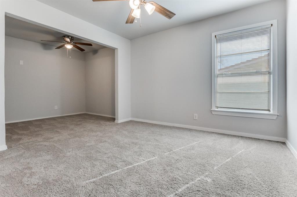 4412 Utah Avenue Dallas, TX 75216 - Photo 6 of 11 an empty room with a empty space and windows