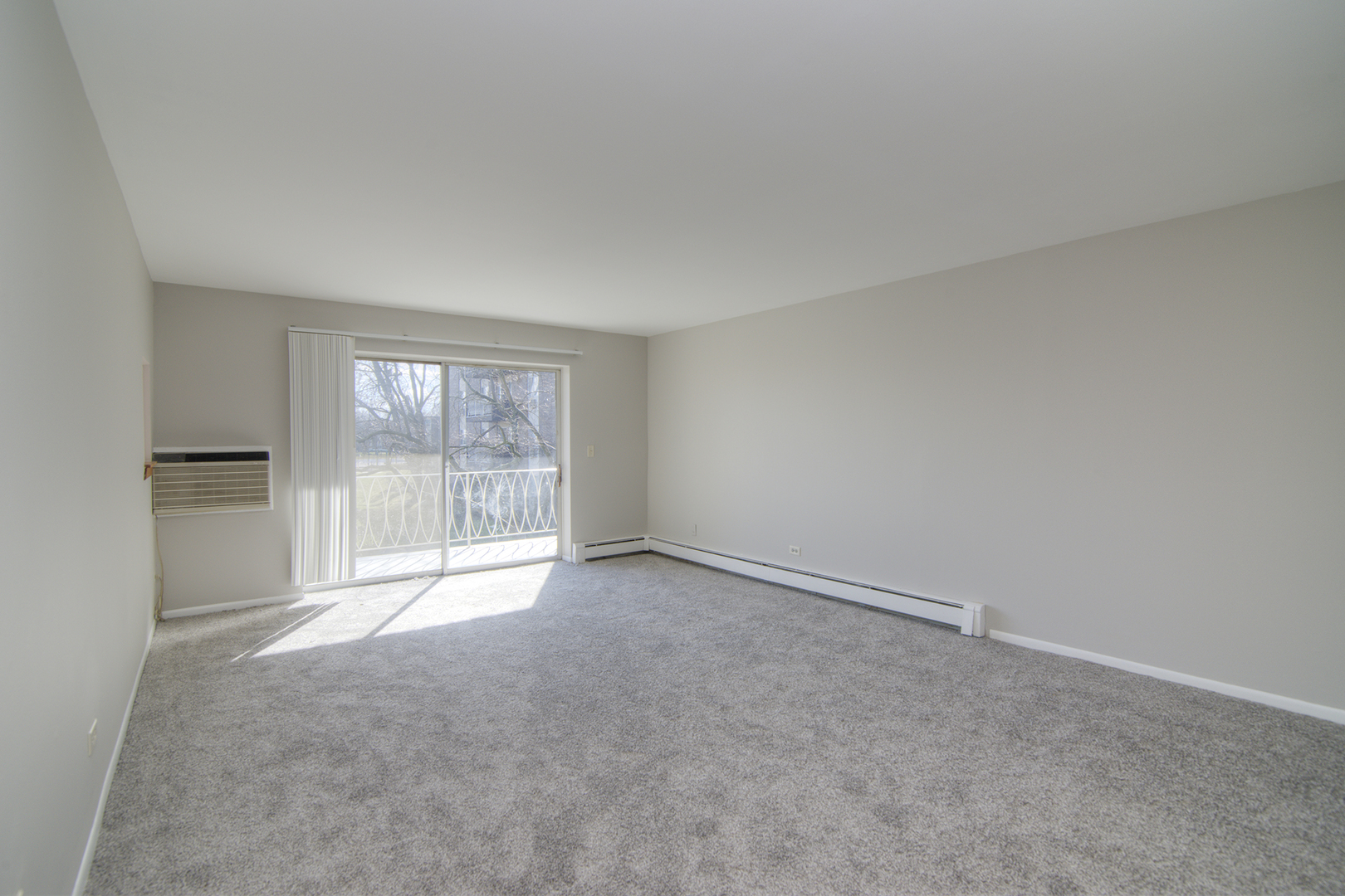 1301 South Finley Road, Unit 204 Lombard, IL 60148 - Photo 8 of 24 an empty room with windows