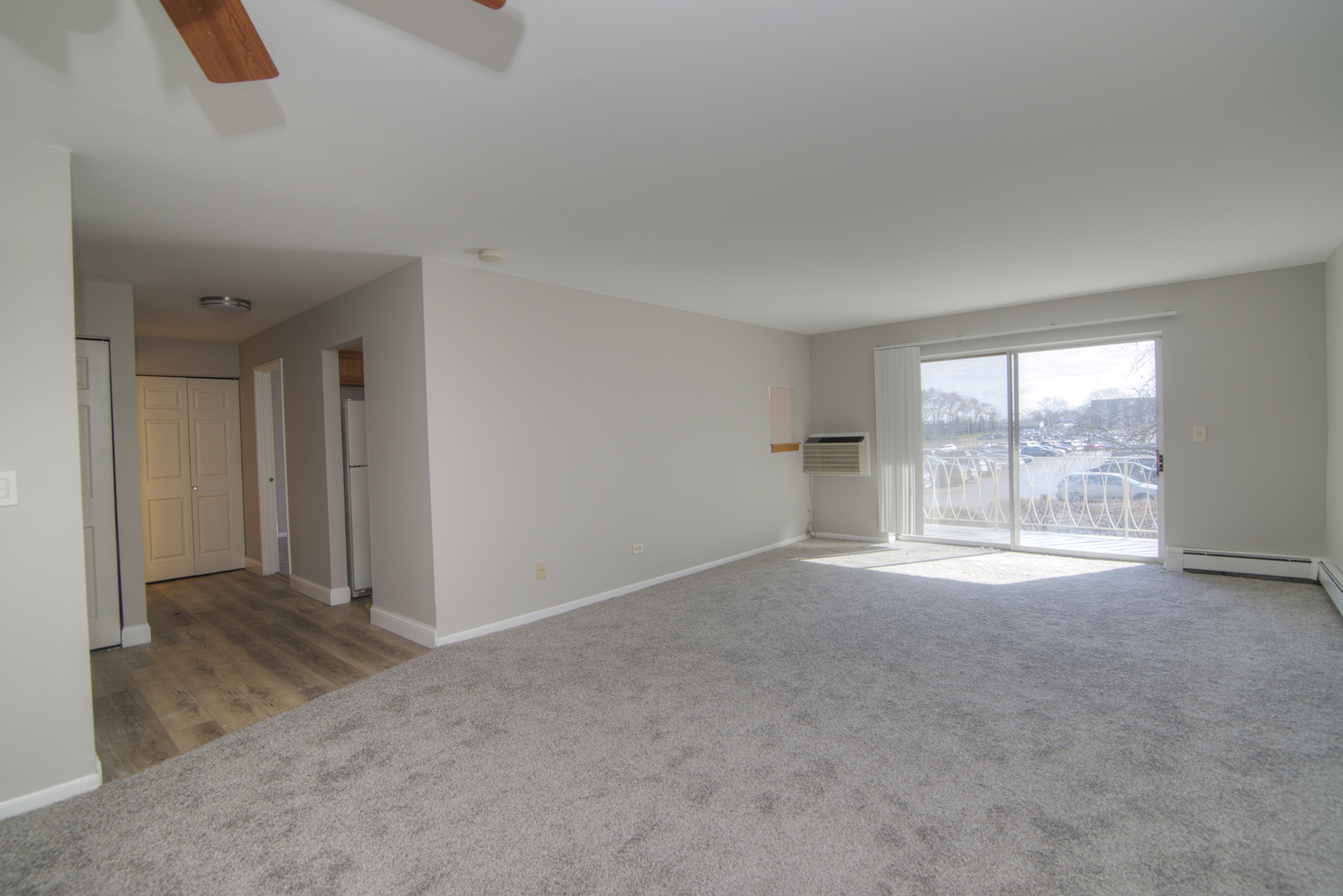 1301 South Finley Road, Unit 204 Lombard, IL 60148 - Photo 9 of 24 an empty room with windows