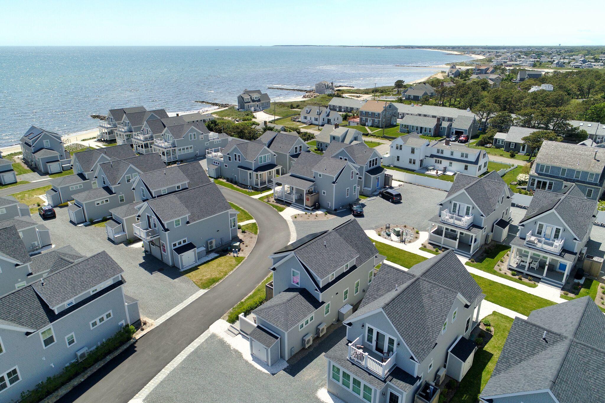 61 Old Wharf Road, Unit 62 Dennis Port, MA 02639 - Photo 20 of 25 an aerial view of multiple house