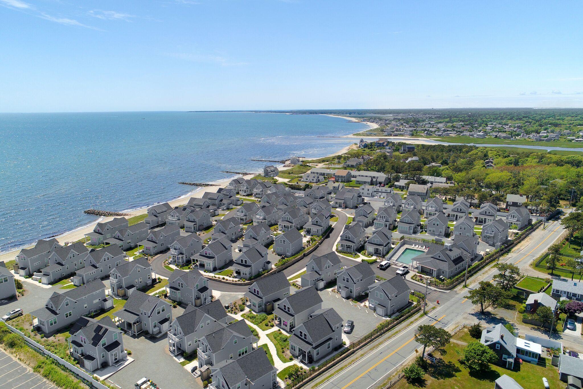 61 Old Wharf Road, Unit 62 Dennis Port, MA 02639 - Photo 22 of 25 an aerial view of multiple house