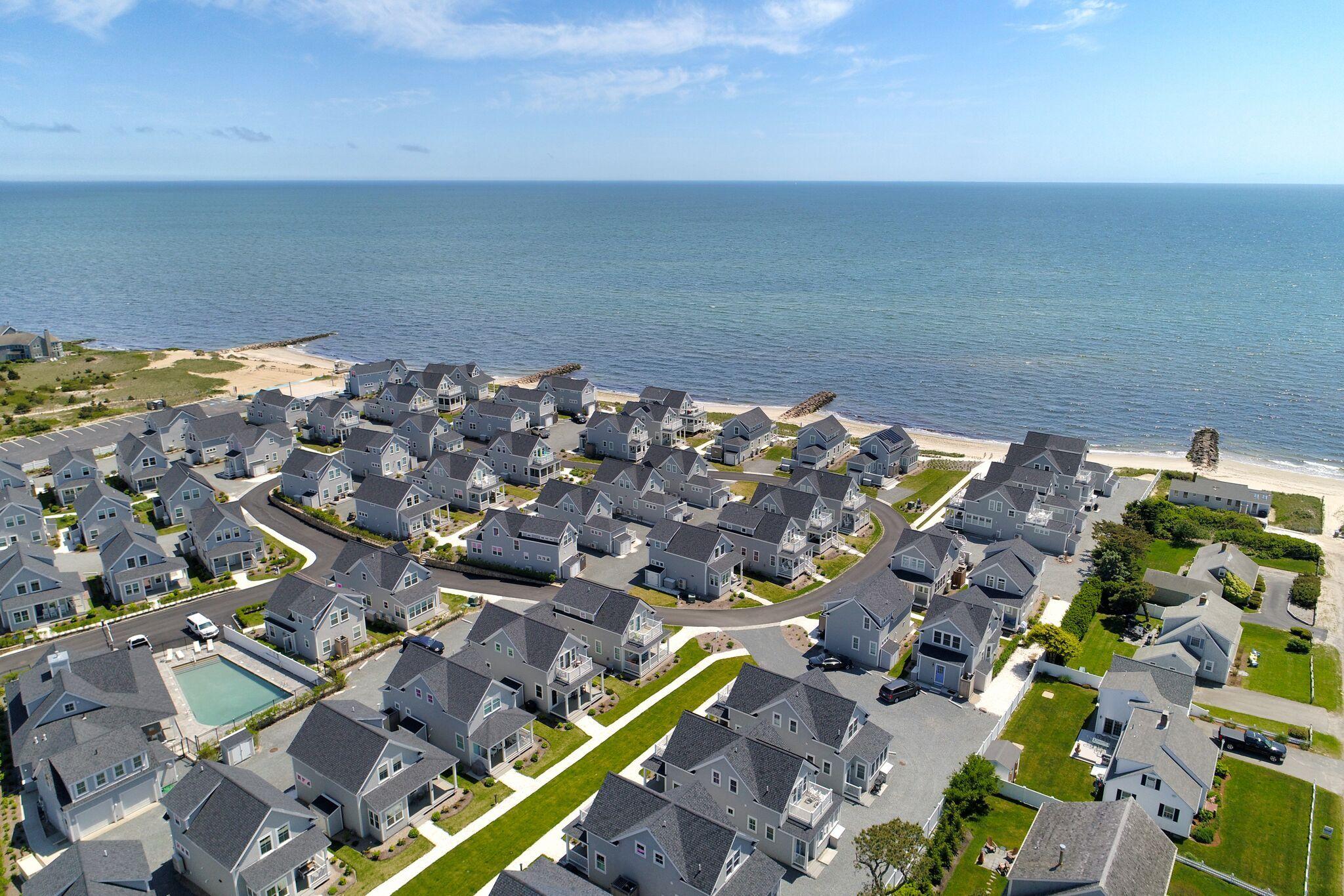 61 Old Wharf Road, Unit 62 Dennis Port, MA 02639 - Photo 24 of 25 an aerial view of multiple house