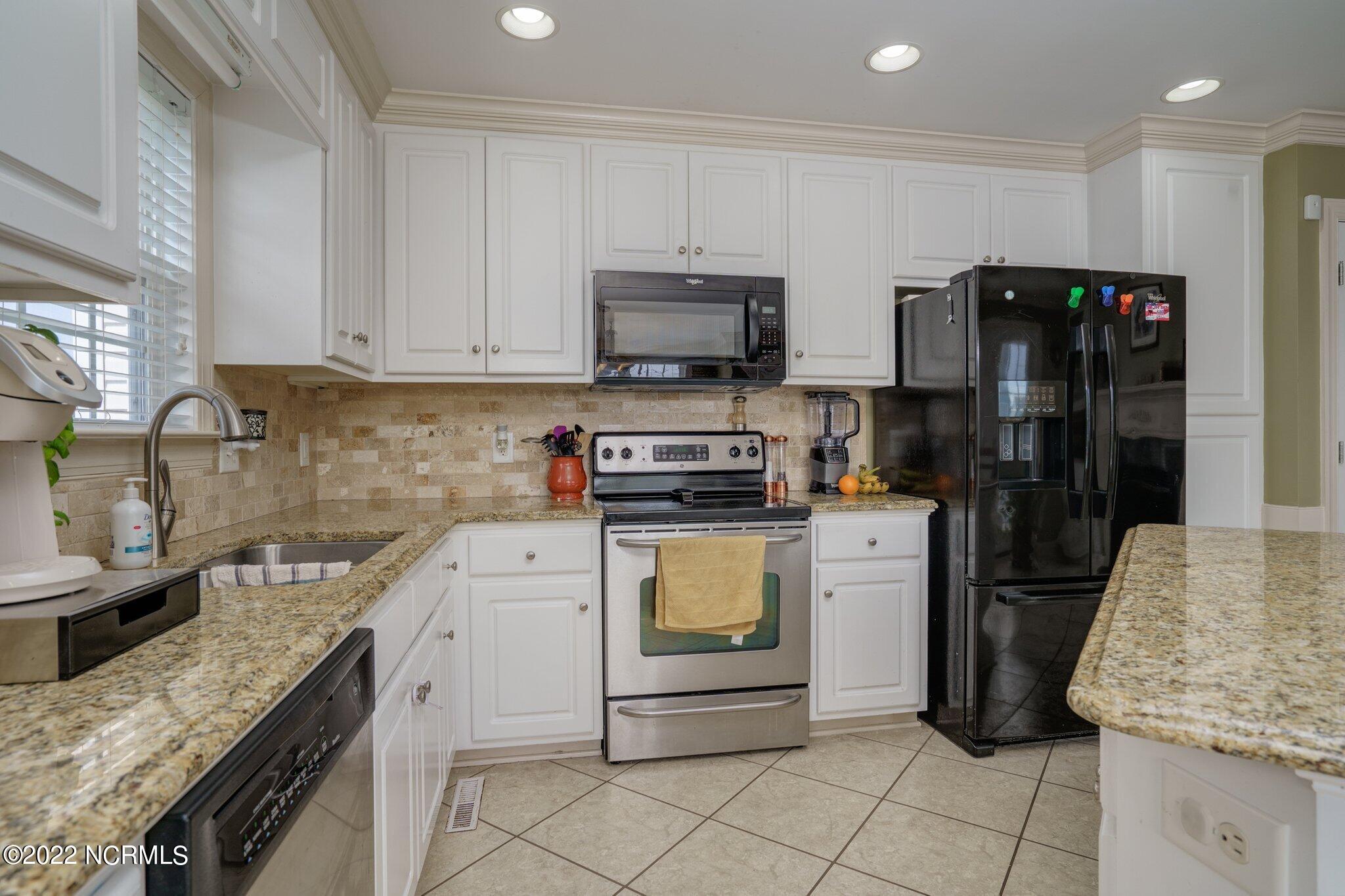 1045 Oak Grove Road Rocky Mount, NC 27804 - Photo 19 of 32 Tile floors