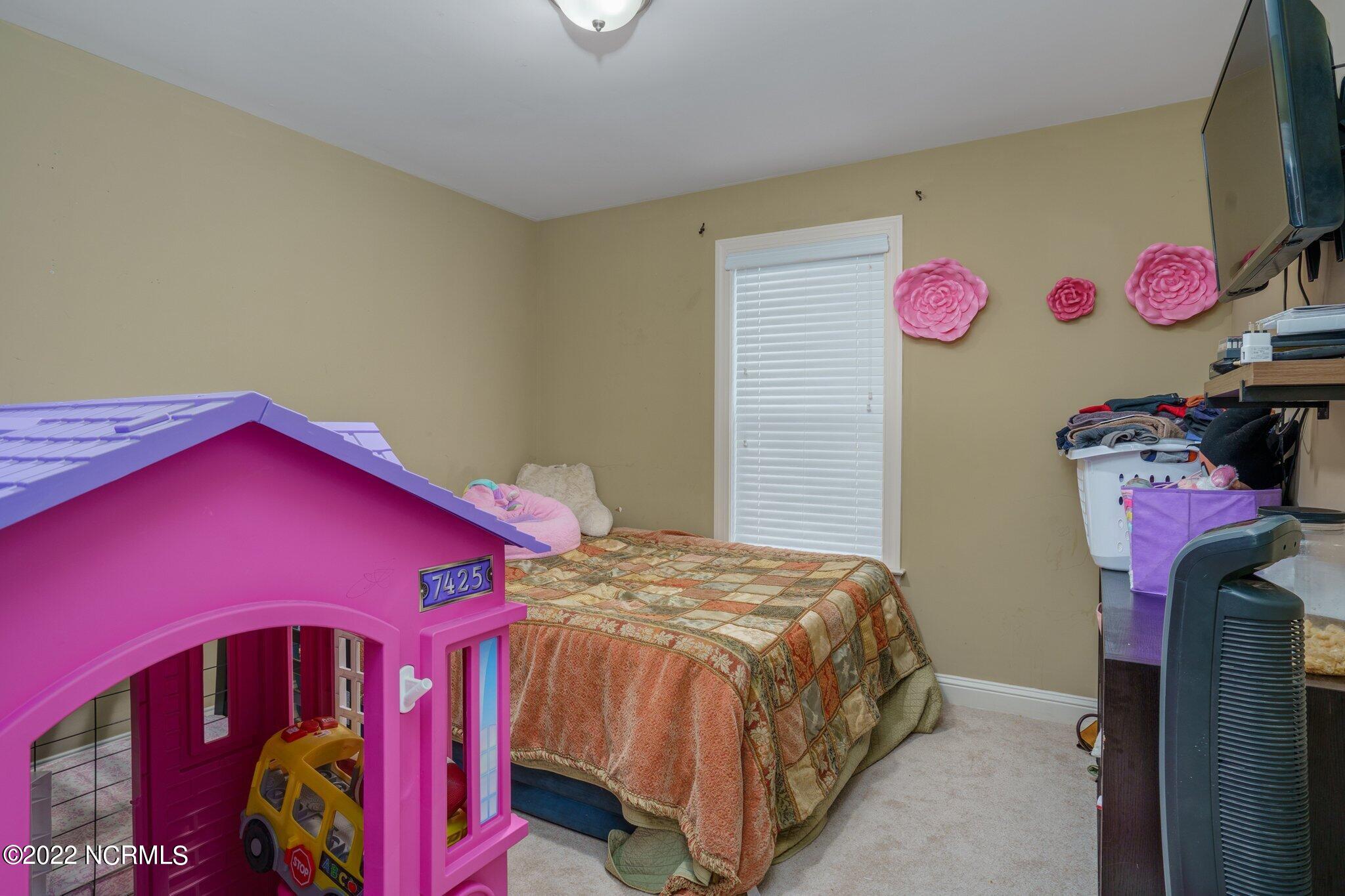 1045 Oak Grove Road Rocky Mount, NC 27804 - Photo 21 of 32 Bedroom 2