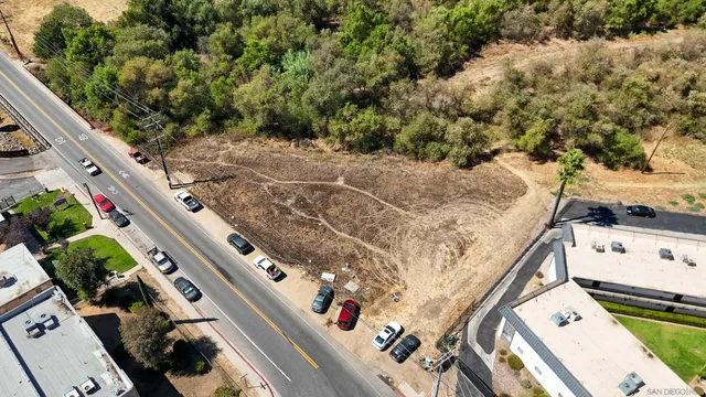an aerial view of house with yard