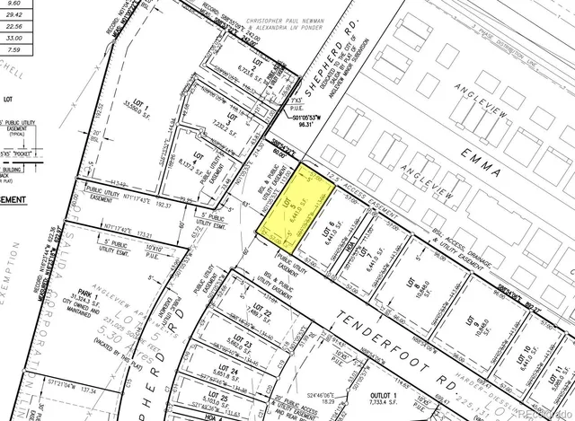 a front view of a house with parking space