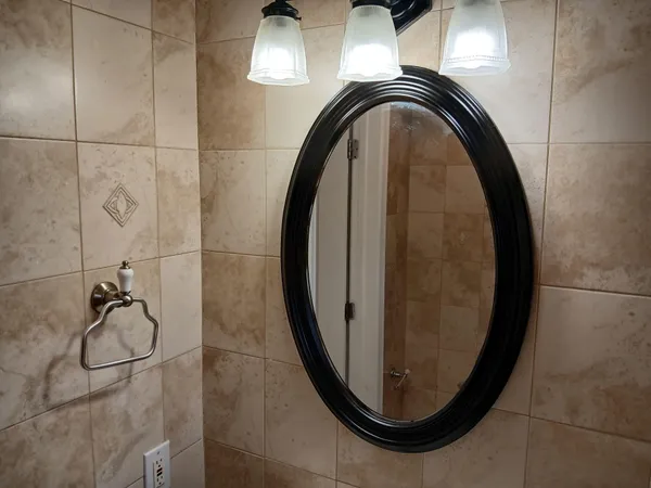 a bathroom with a sink and a mirror