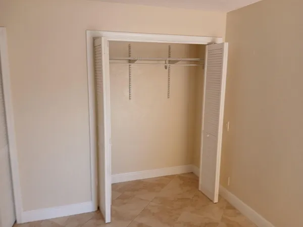 a bathroom with a shower and a toilet