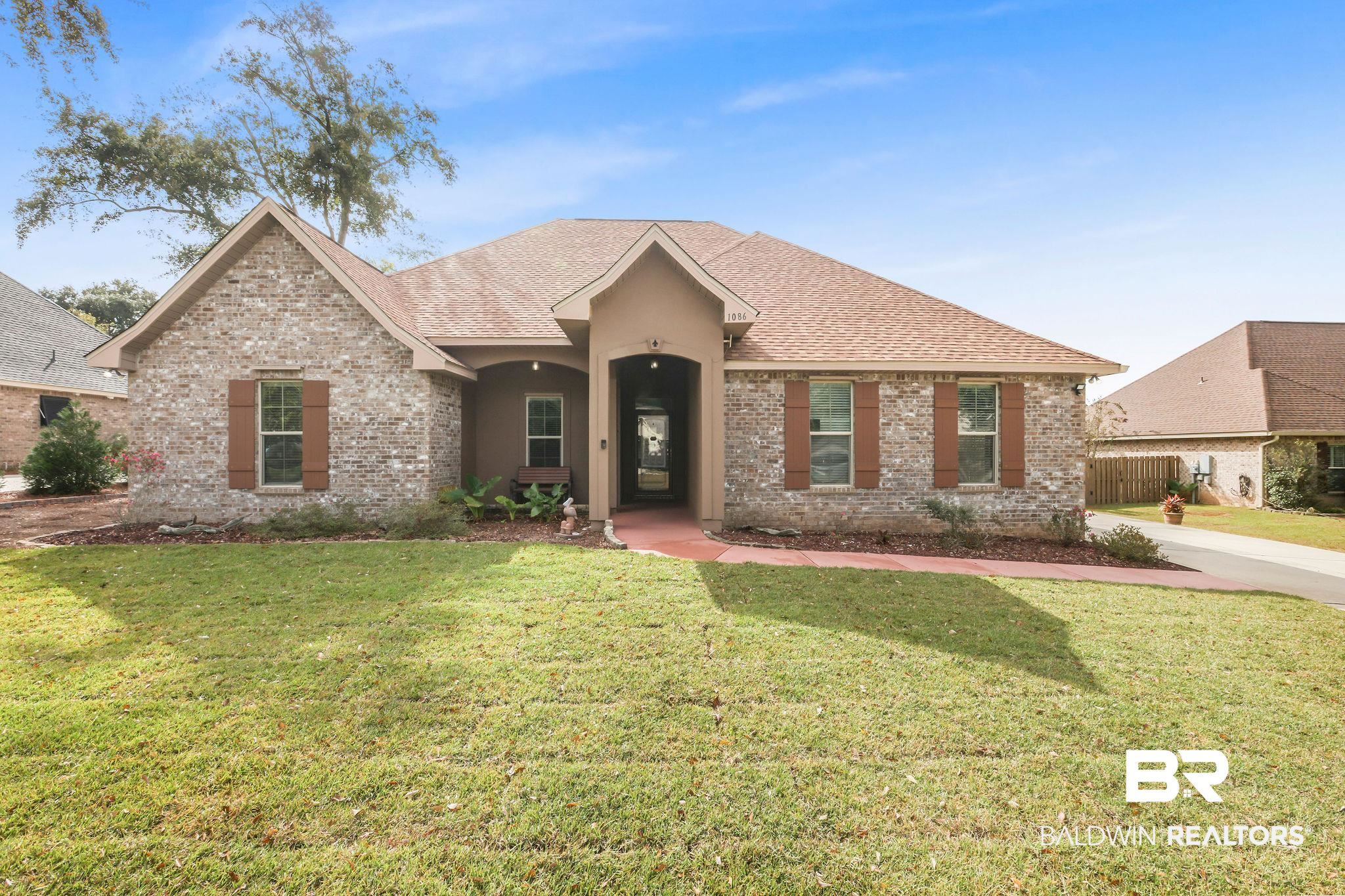 1086 Destin Avenue Foley, AL 36535 - Photo 1 of 30 View of front facade with a front lawn