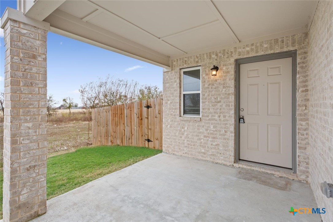 907 East Main Street, Unit A&B Troy, TX 76579 - Photo 2 of 28 a view of a backyard with wooden fence