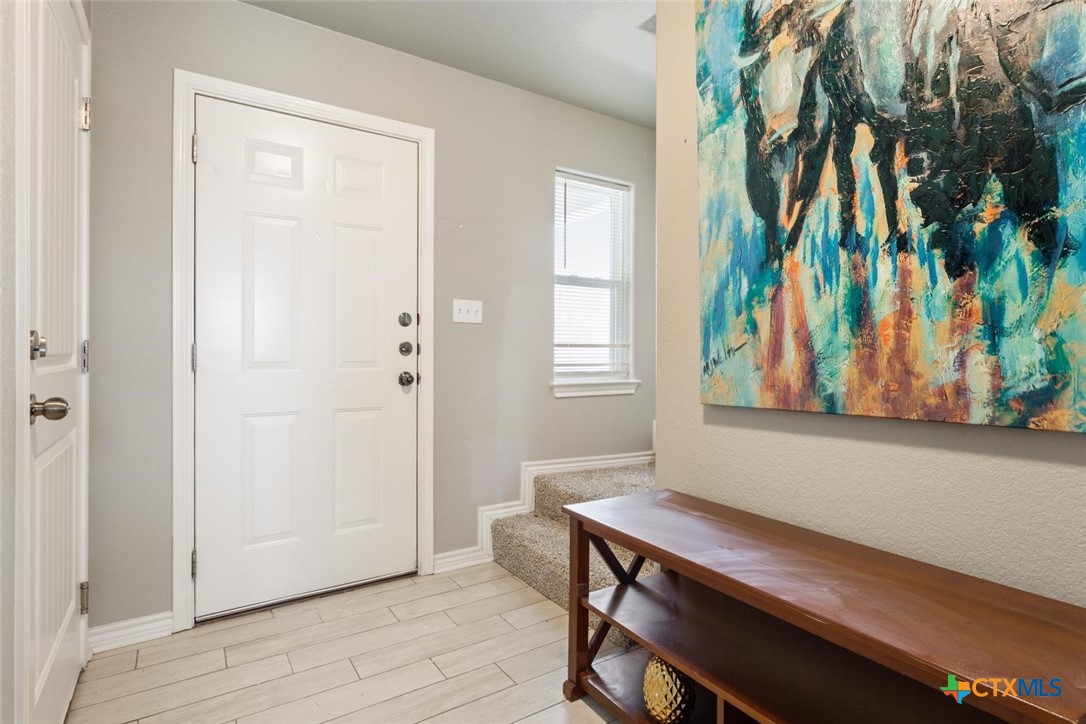 907 East Main Street, Unit A&B Troy, TX 76579 - Photo 3 of 28 a view of a room with a table and chairs