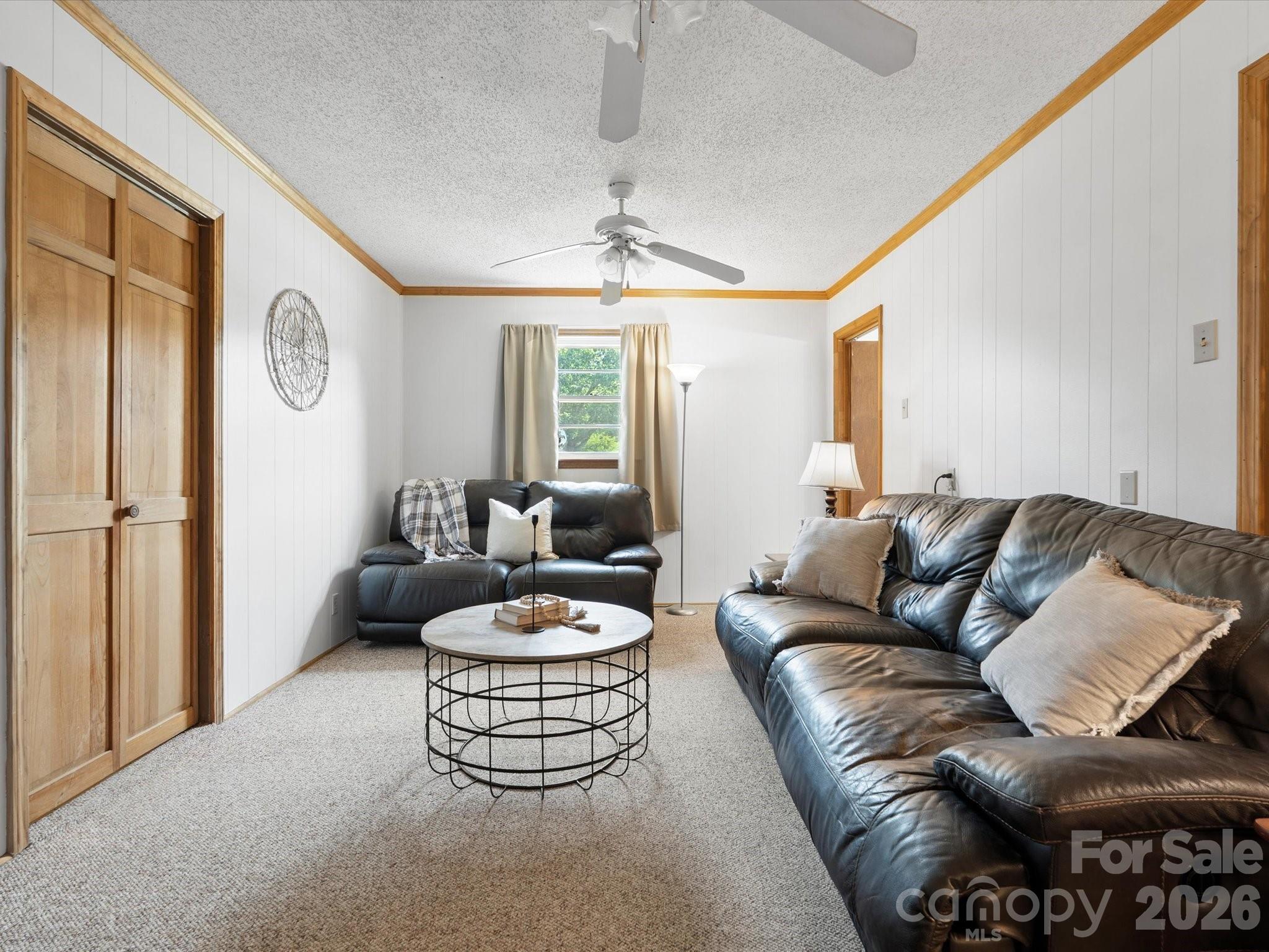 2212 J B Denton Road Lancaster, SC 29720 - Photo 13 of 38 a living room with furniture and a large window