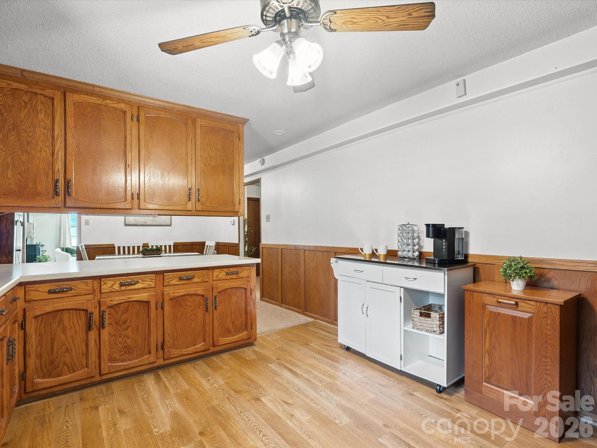 2212 J B Denton Road Lancaster, SC 29720 - Photo 23 of 38 a kitchen with a sink cabinets and stainless steel appliances