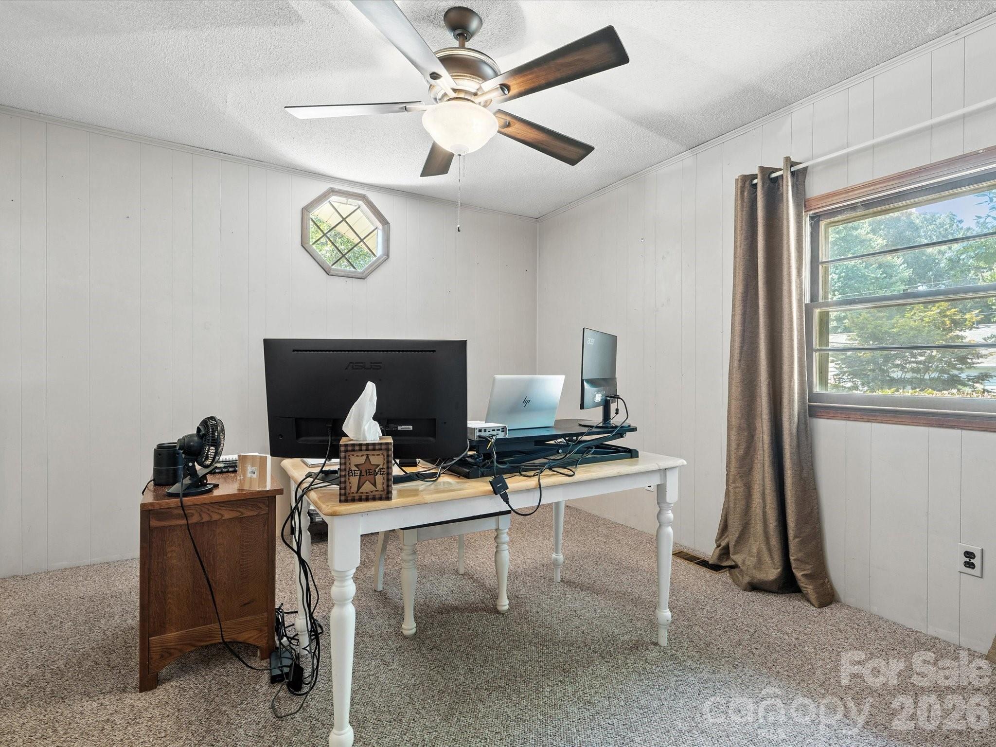 2212 J B Denton Road Lancaster, SC 29720 - Photo 25 of 38 a workspace with furniture and window