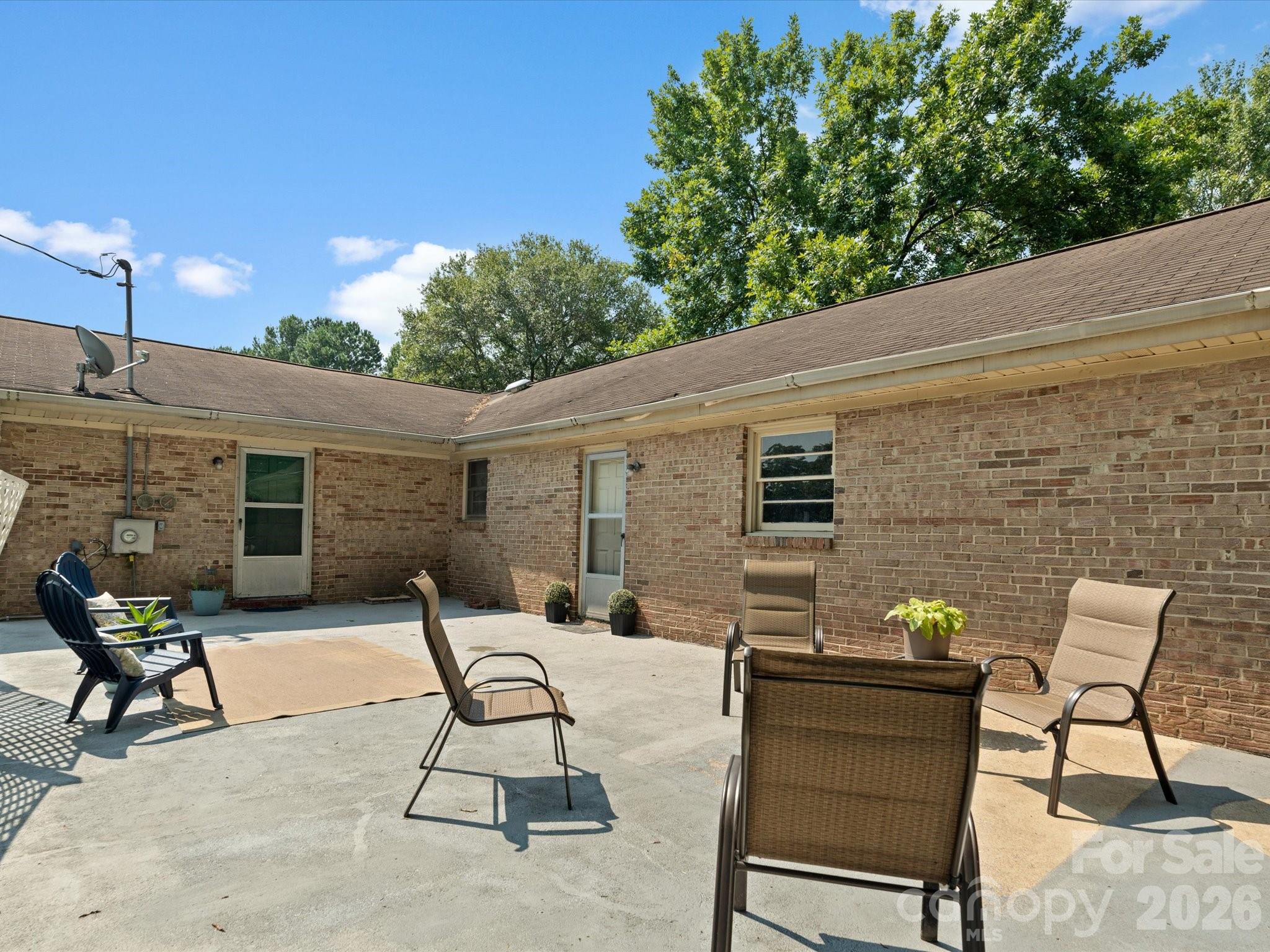 2212 J B Denton Road Lancaster, SC 29720 - Photo 28 of 38 a view of a patio with couple of chairs