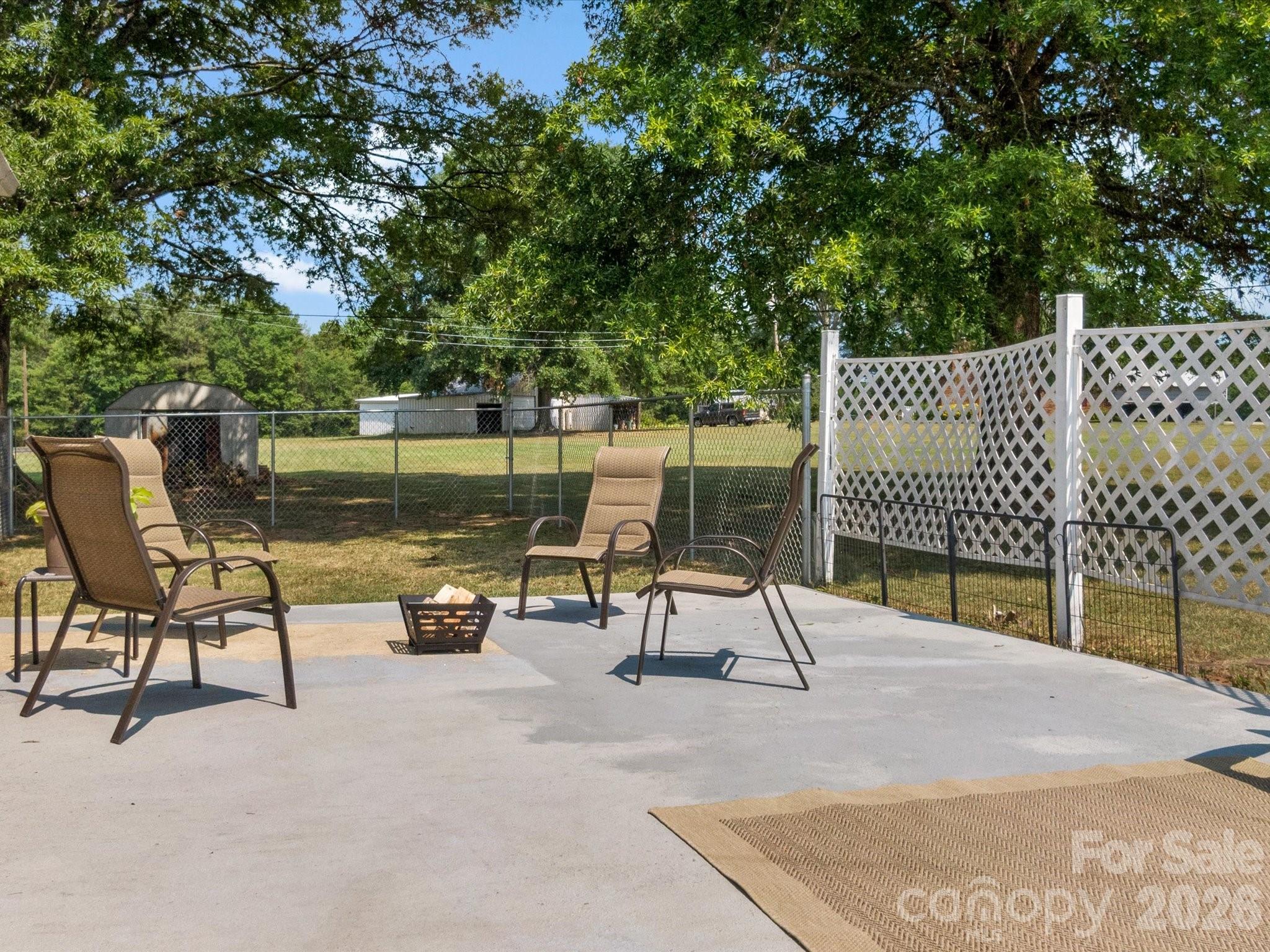 2212 J B Denton Road Lancaster, SC 29720 - Photo 29 of 38 a park with bench and lake view