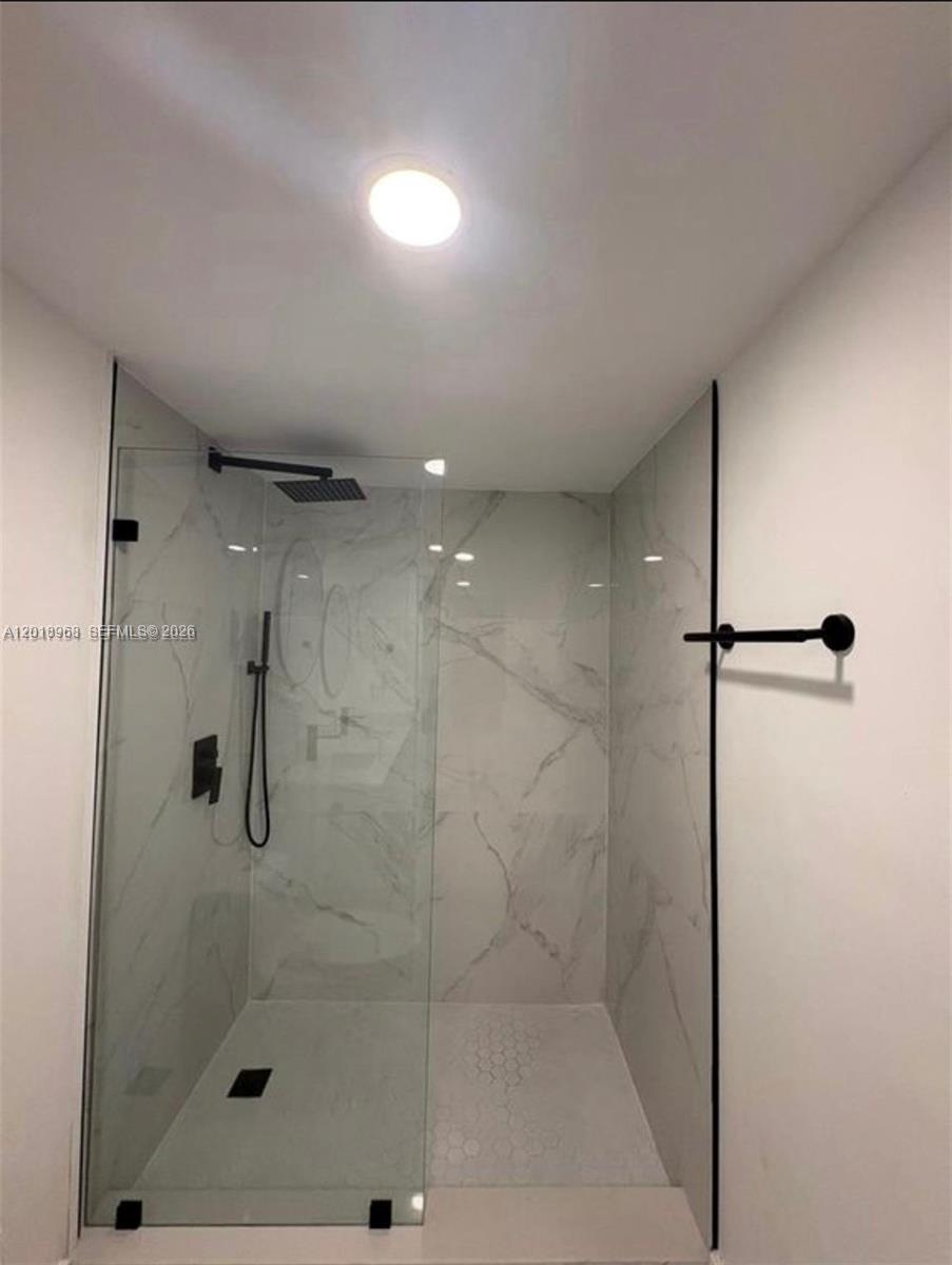 6104 Southwest 33rd Street Miramar, FL 33023 - Photo 9 of 18 a bathroom with a shower