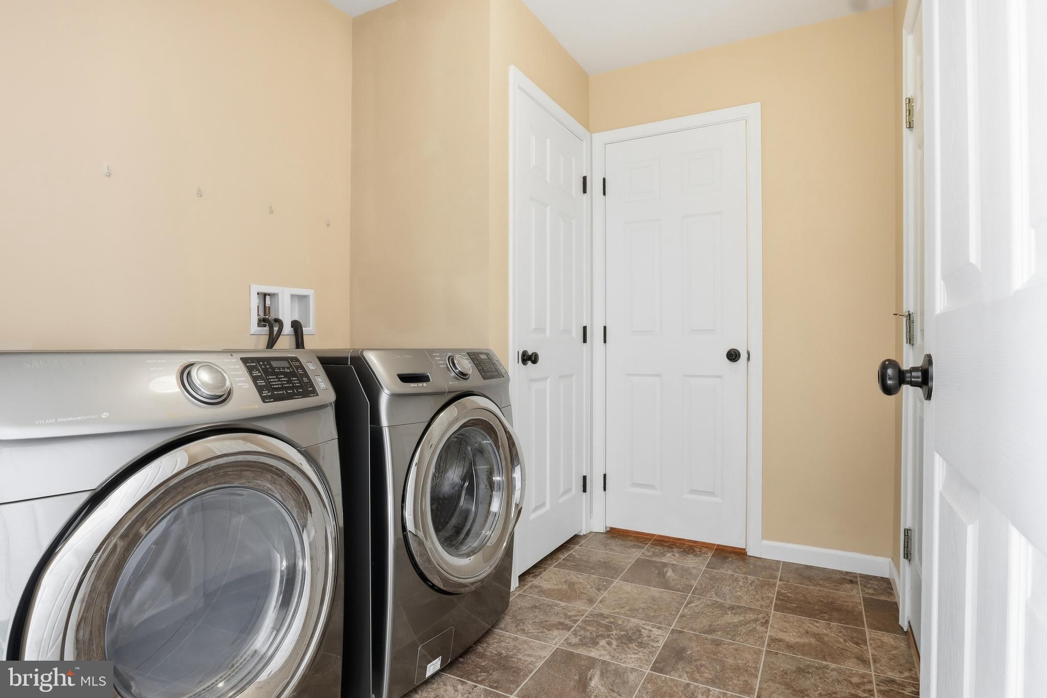 370 Azalea Drive Windsor, PA 17366 - Photo 16 of 40 a view of a storage & utility room with dryer and washer