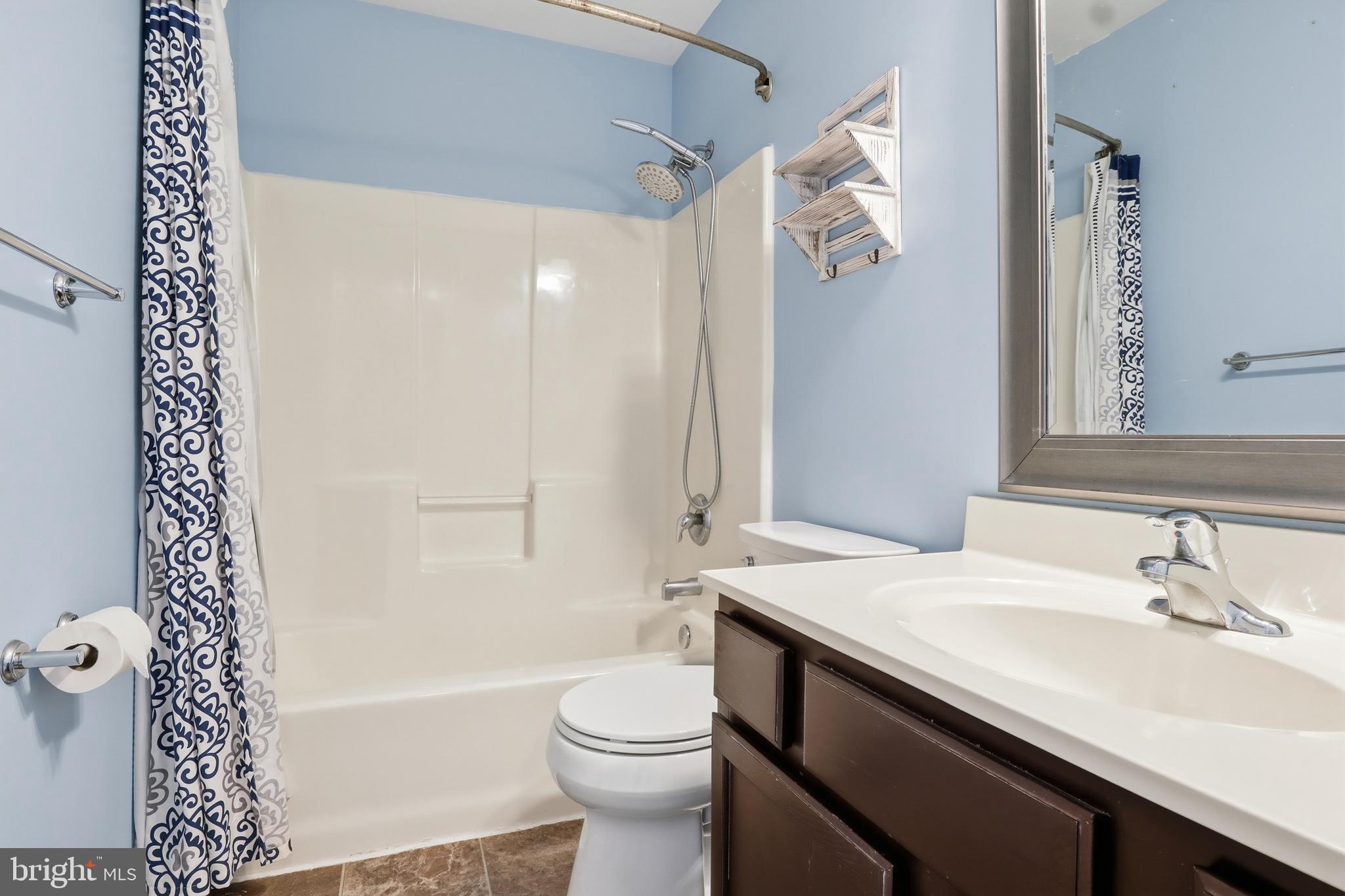 370 Azalea Drive Windsor, PA 17366 - Photo 23 of 40 a bathroom with a sink a toilet and shower