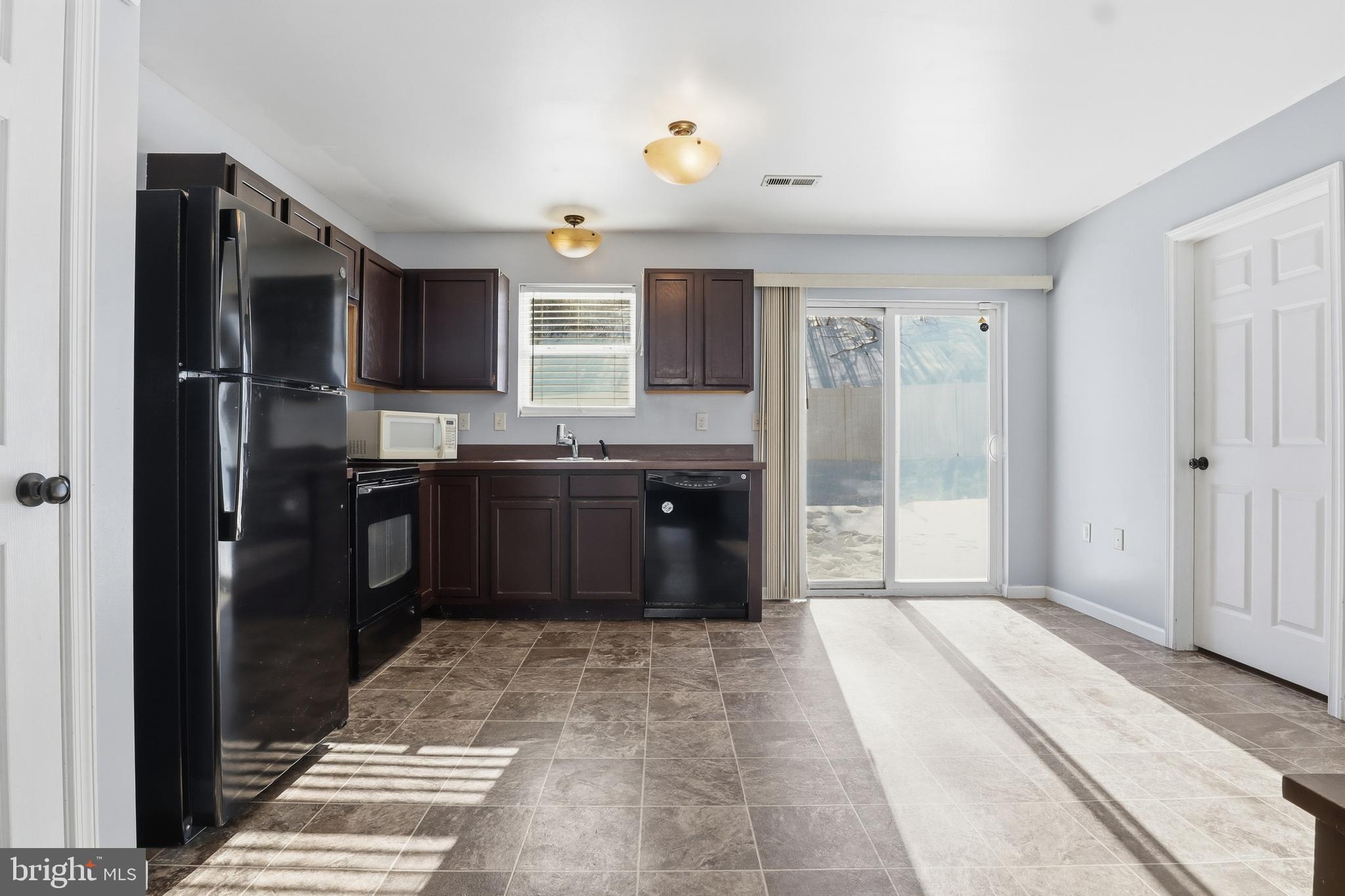 370 Azalea Drive Windsor, PA 17366 - Photo 9 of 40 a kitchen with stainless steel appliances granite countertop a refrigerator and a sink