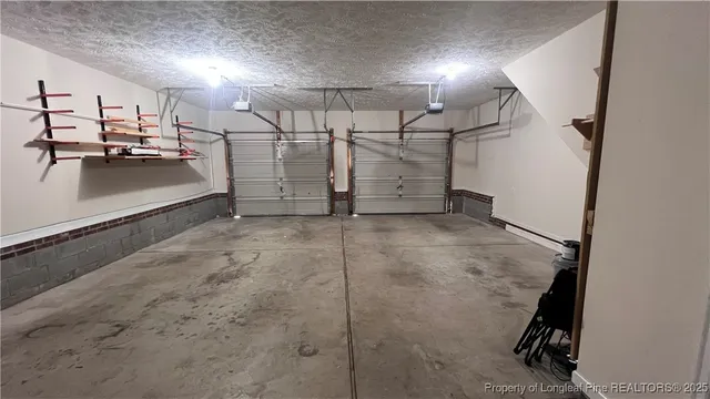 a view of a house with a small deck