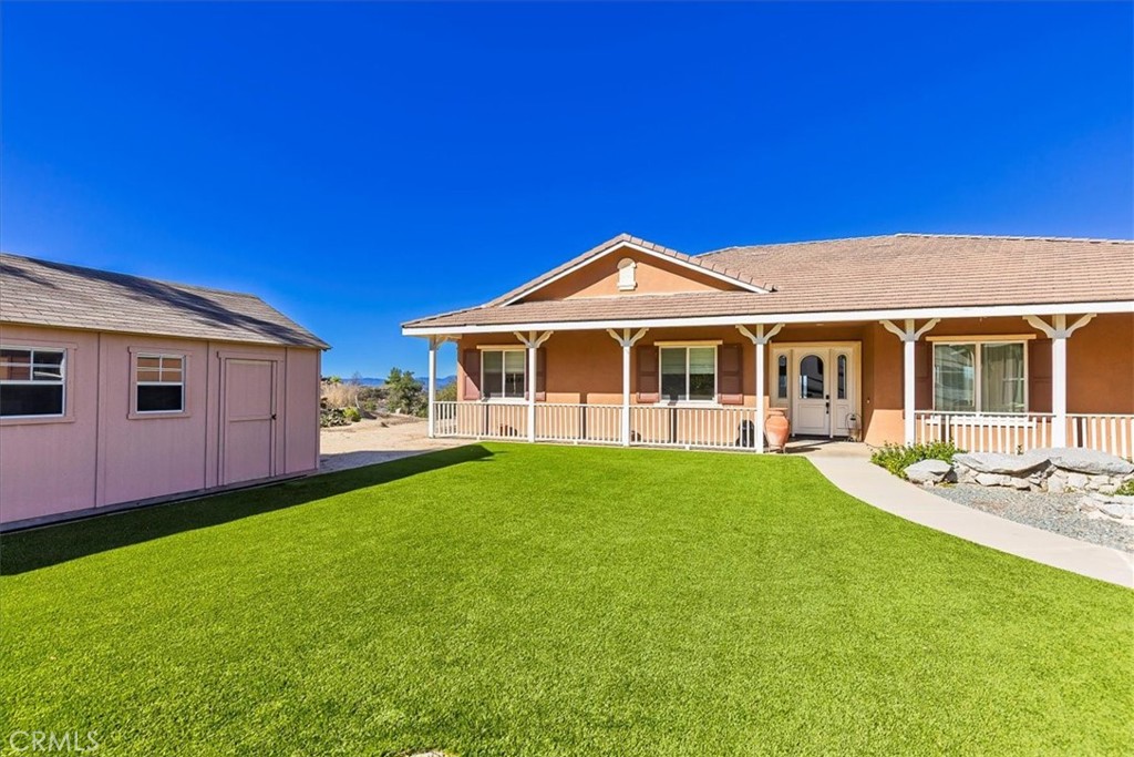 39110 Loren Way Temecula, CA 92592 - Photo 2 of 42 a view of a house with a backyard