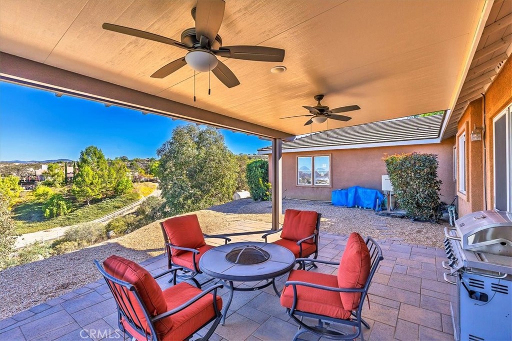 39110 Loren Way Temecula, CA 92592 - Photo 40 of 42 a outdoor living space with furniture and garden view