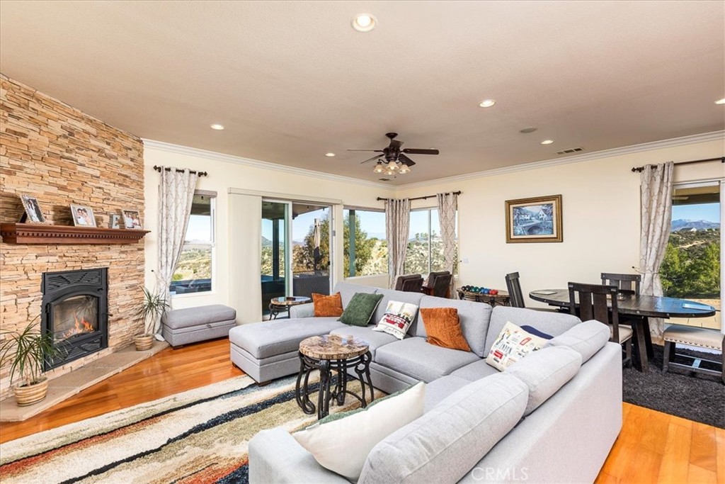 39110 Loren Way Temecula, CA 92592 - Photo 7 of 42 a living room with furniture and a fireplace