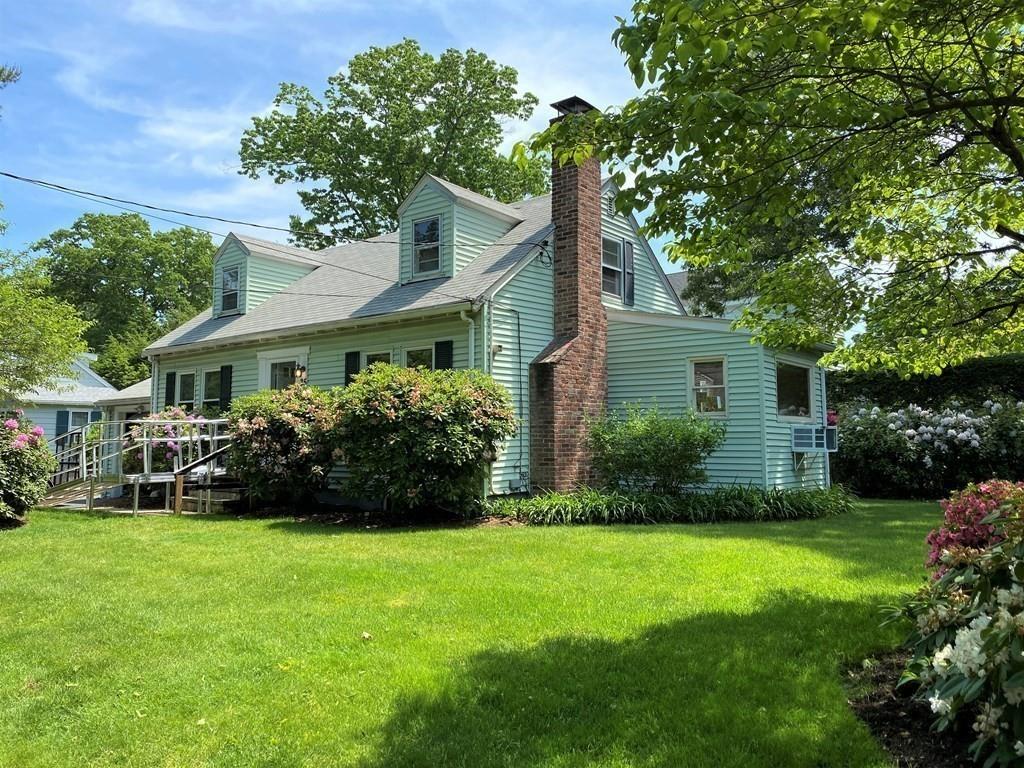 25 Clearwater Road Newton, MA 02462 - Photo 1 of 23 a front view of house with yard and green space