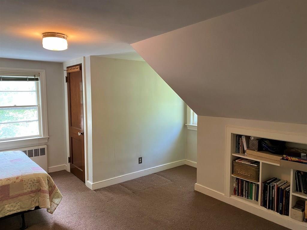 25 Clearwater Road Newton, MA 02462 - Photo 14 of 23 a view of a livingroom with furniture and staircase