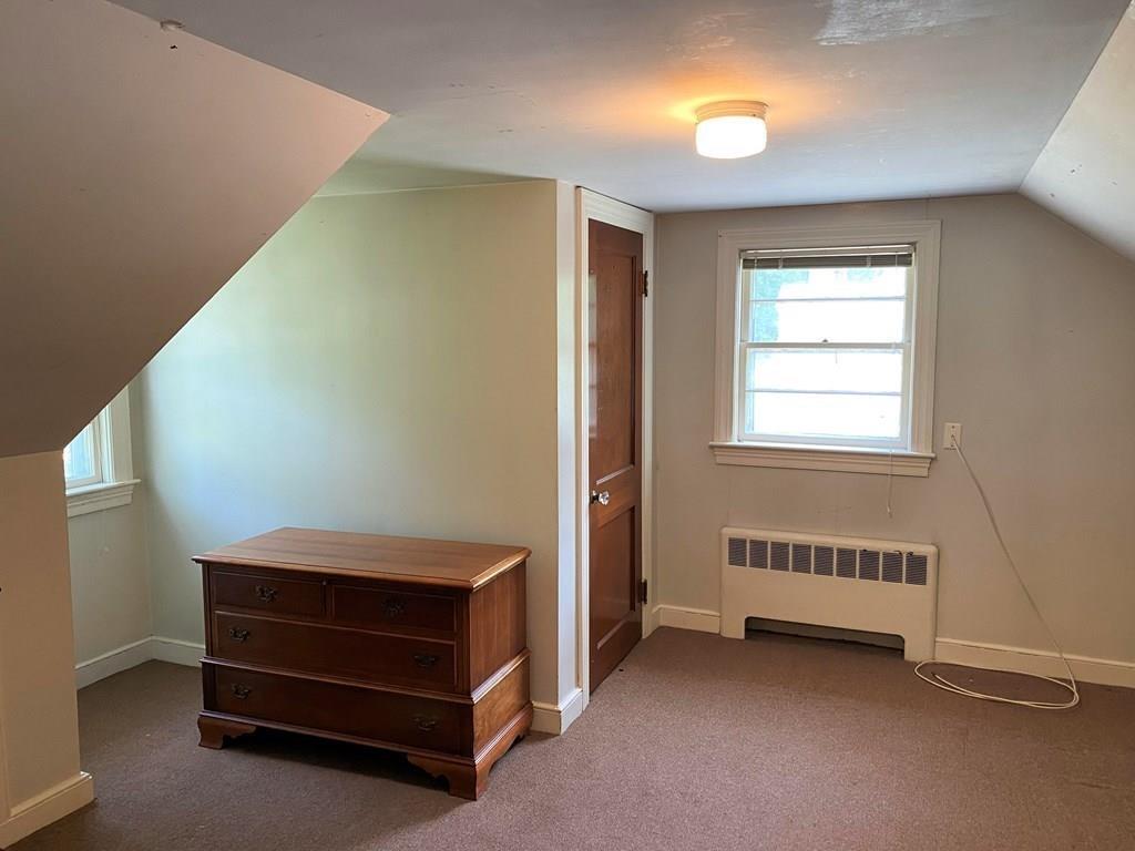 25 Clearwater Road Newton, MA 02462 - Photo 15 of 23 a view of room with window and a ceiling fan