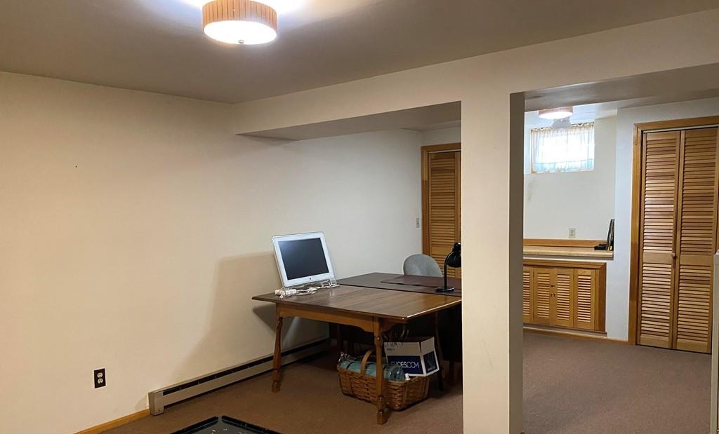 25 Clearwater Road Newton, MA 02462 - Photo 16 of 23 a view of a workspace with furniture