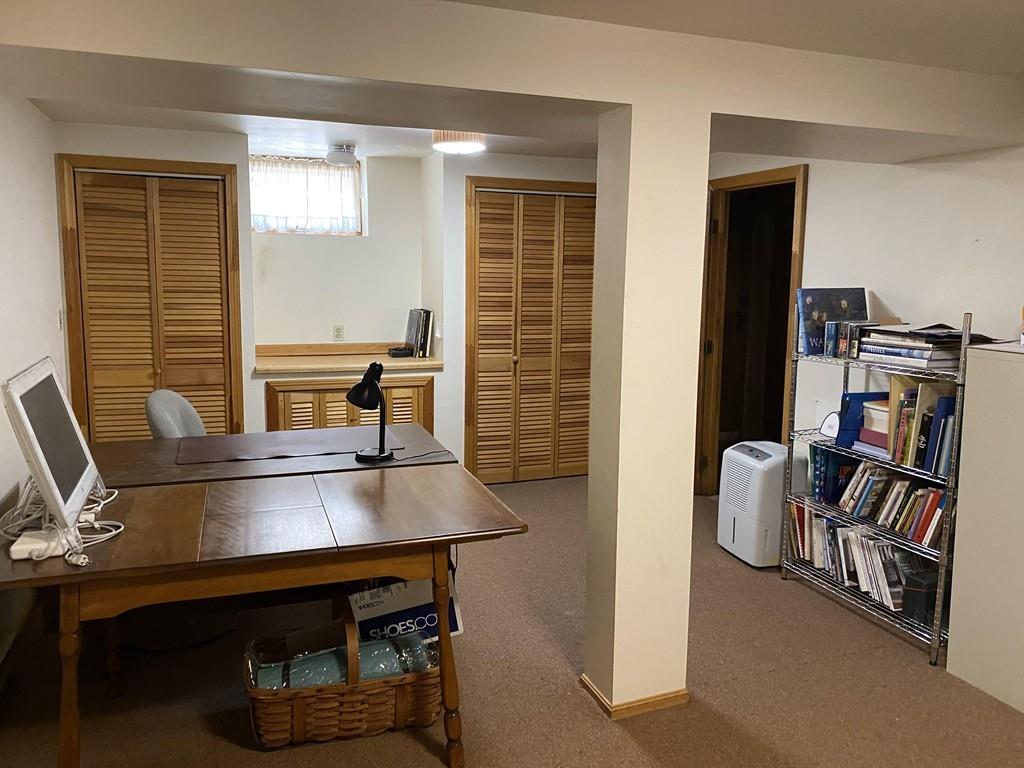 25 Clearwater Road Newton, MA 02462 - Photo 17 of 23 a view of a workspace with furniture and window