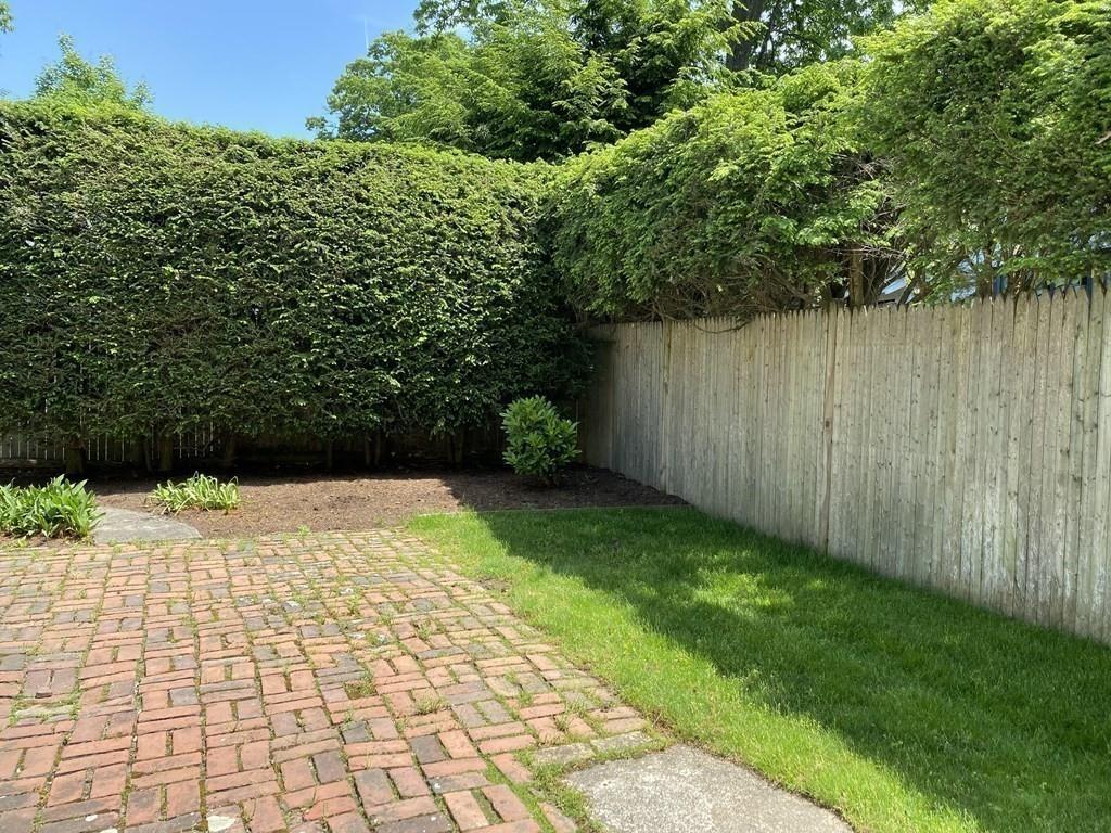 25 Clearwater Road Newton, MA 02462 - Photo 19 of 23 a view of a backyard with pathway