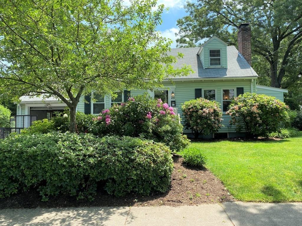 25 Clearwater Road Newton, MA 02462 - Photo 2 of 23 a front view of a house with a garden